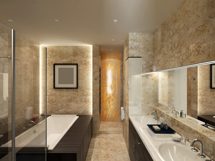A narrow and rectangular bathroom with a long white bathtub and double basin.