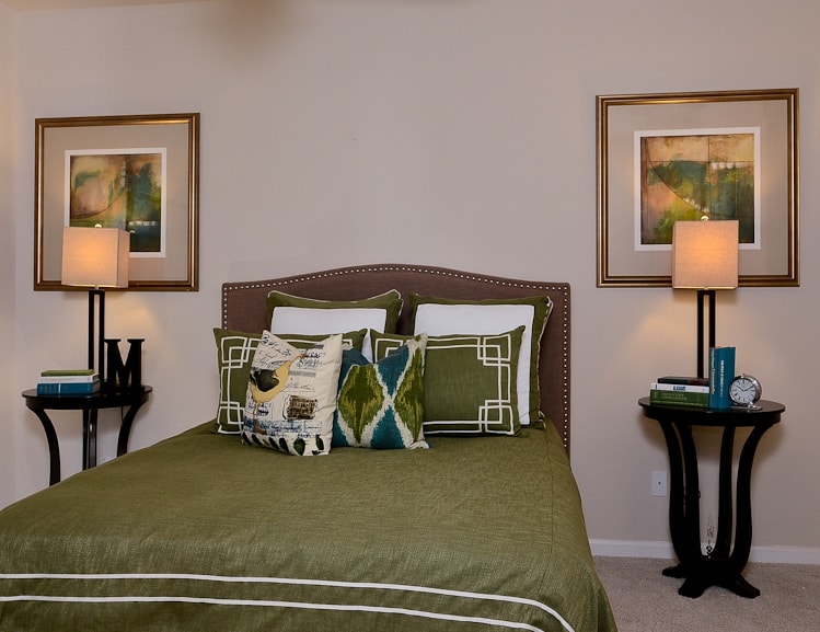 Sometimes forest green color - used extensively against a neutral backdrop -can make even the smallest of bedrooms pop.